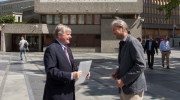 Denis de Kergorlay receiving the nomination for ‘The 7 Most Endangered’ 2016 from Ola Fjeldheim in front of the Y-block, Oslo, 10 June 2015. Photo: Felix Quaedvlieg