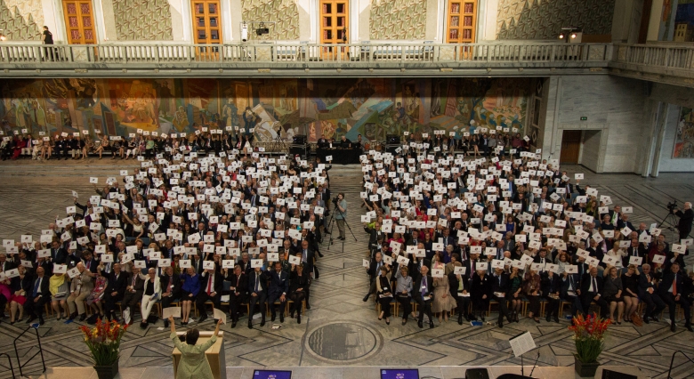 All the attendees of the Awards Ceremony held at Oslo City Hall on 11 June 2015, showing their support to UNESCO’s campaign #Unite4Heritage. Photo: Felix Quaedvlieg