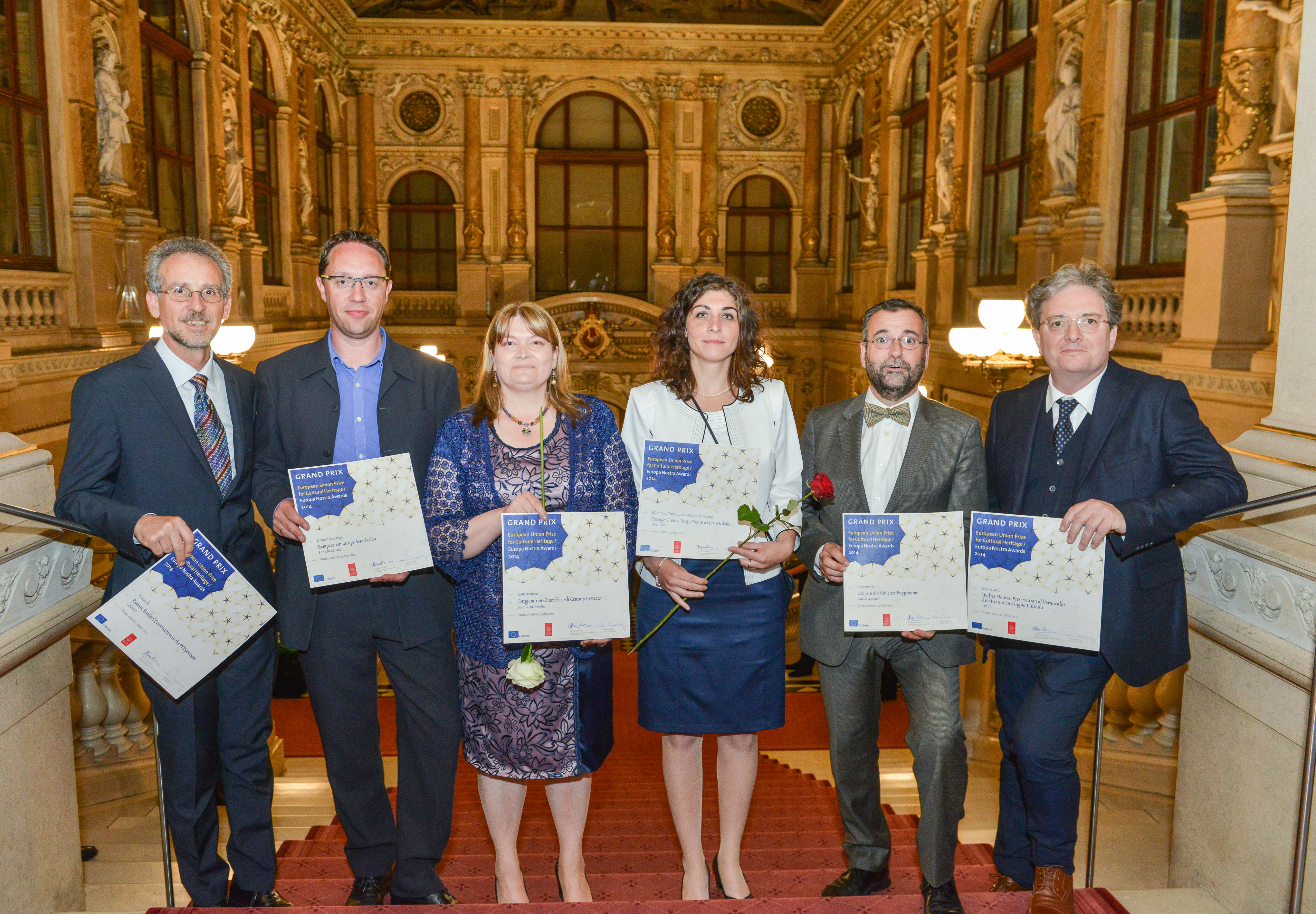 The six Grand Prix winners of the 2014 EU Prize for Cultural Heritage / Europa Nostra Awards after ceremony at the Burgtheater. From the left to the right, award-winning projects from Greece, Belgium, Romania, Hungary, Spain and Italy. Photo: Oreste Schaller.